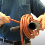Extension cord being wound on a spindle